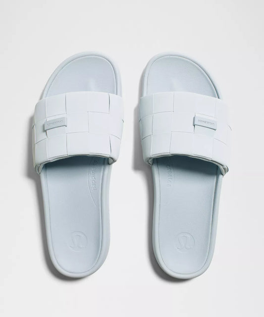 Pair of light blue slides on a white background