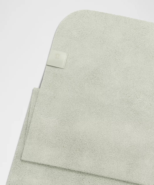 Light green fabric with a label on a white background