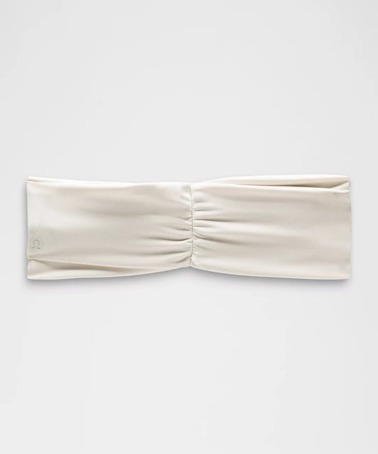 Beige headband on a white background