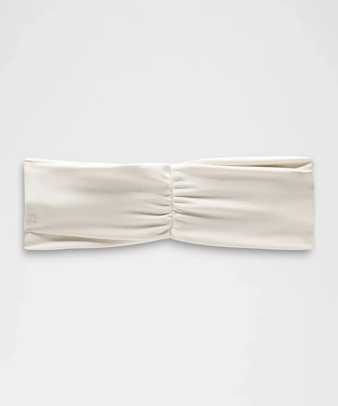 Beige headband on a white background