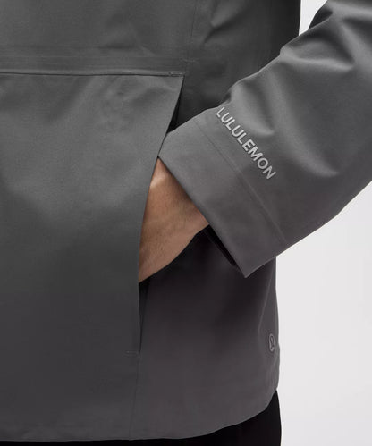 Gray jacket with Lululemon branding on a white background