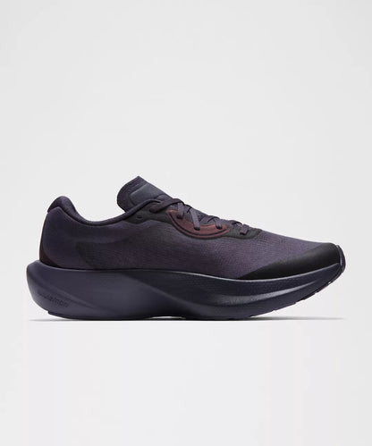 Black athletic shoe on a light gray background