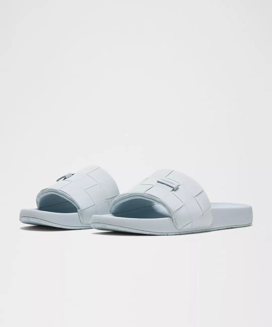 Pair of light blue slides on a white background
