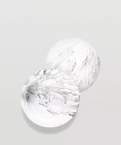 Two clear glass bowls on a light gray background