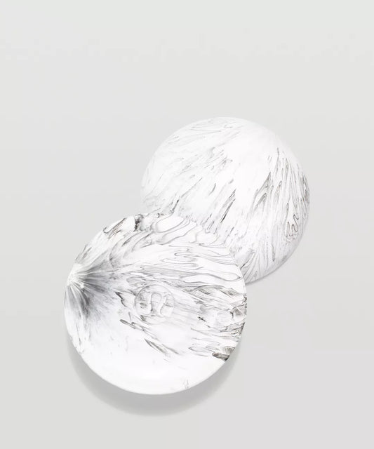 Two clear glass bowls on a light gray background