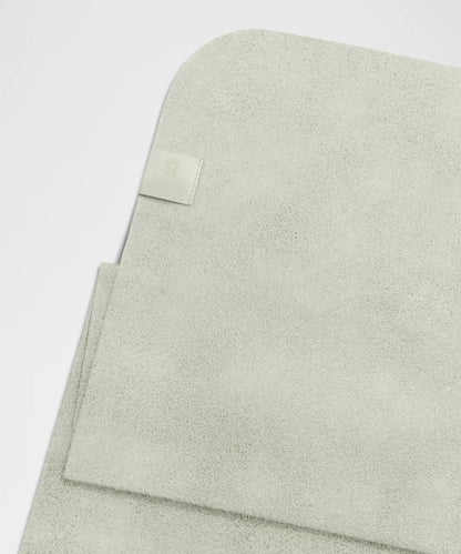 Light green fabric with a label on a white background