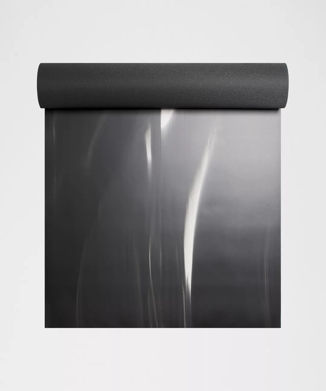 Roll of black paper on a white background