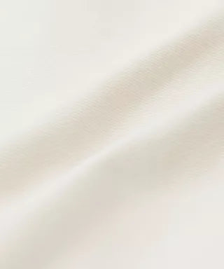 Gradient background transitioning from light beige to white