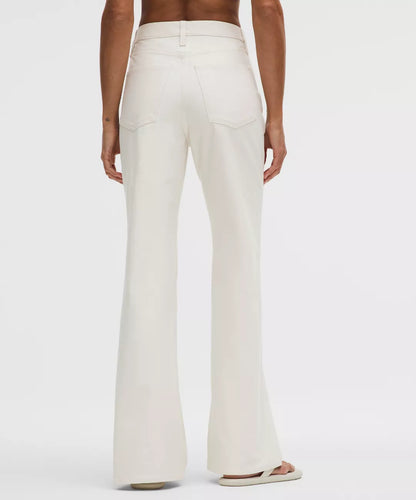 White wide-leg pants worn by a person on a white background