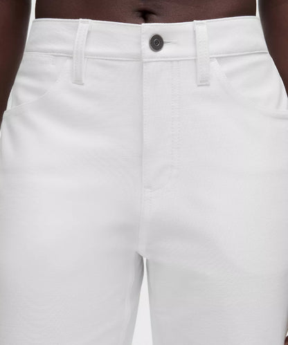 White pants with a button detail on a white background