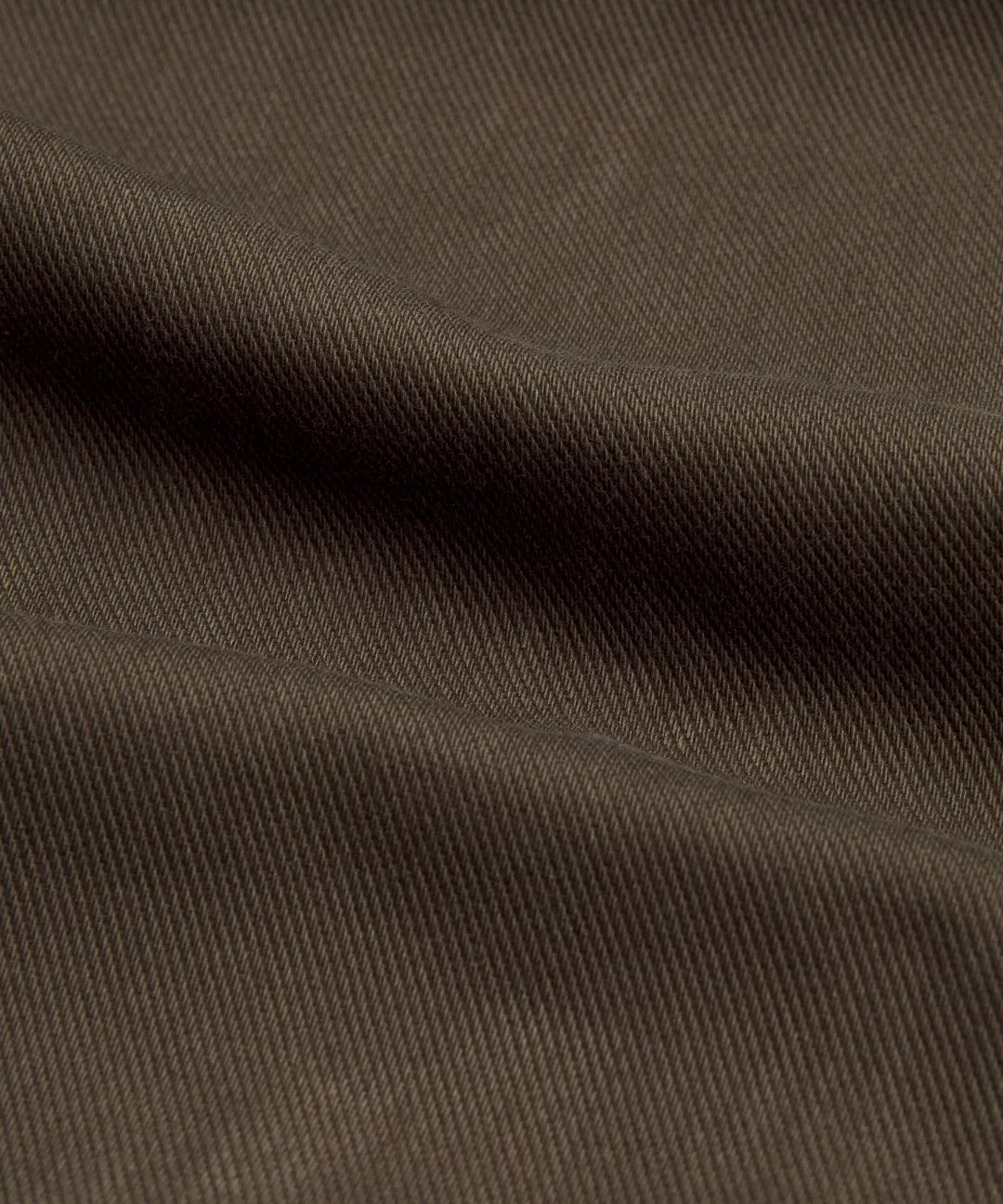 Close-up of brown fabric with visible texture