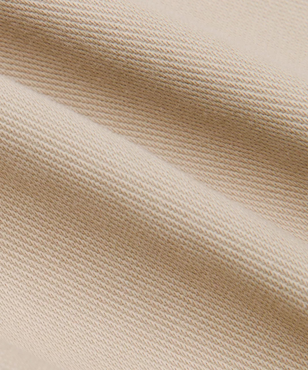 Close-up of beige fabric texture