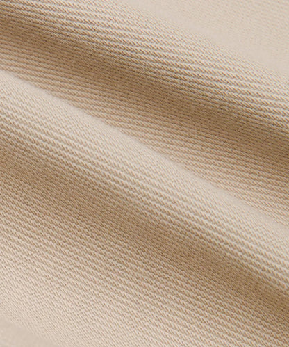 Close-up of beige fabric texture