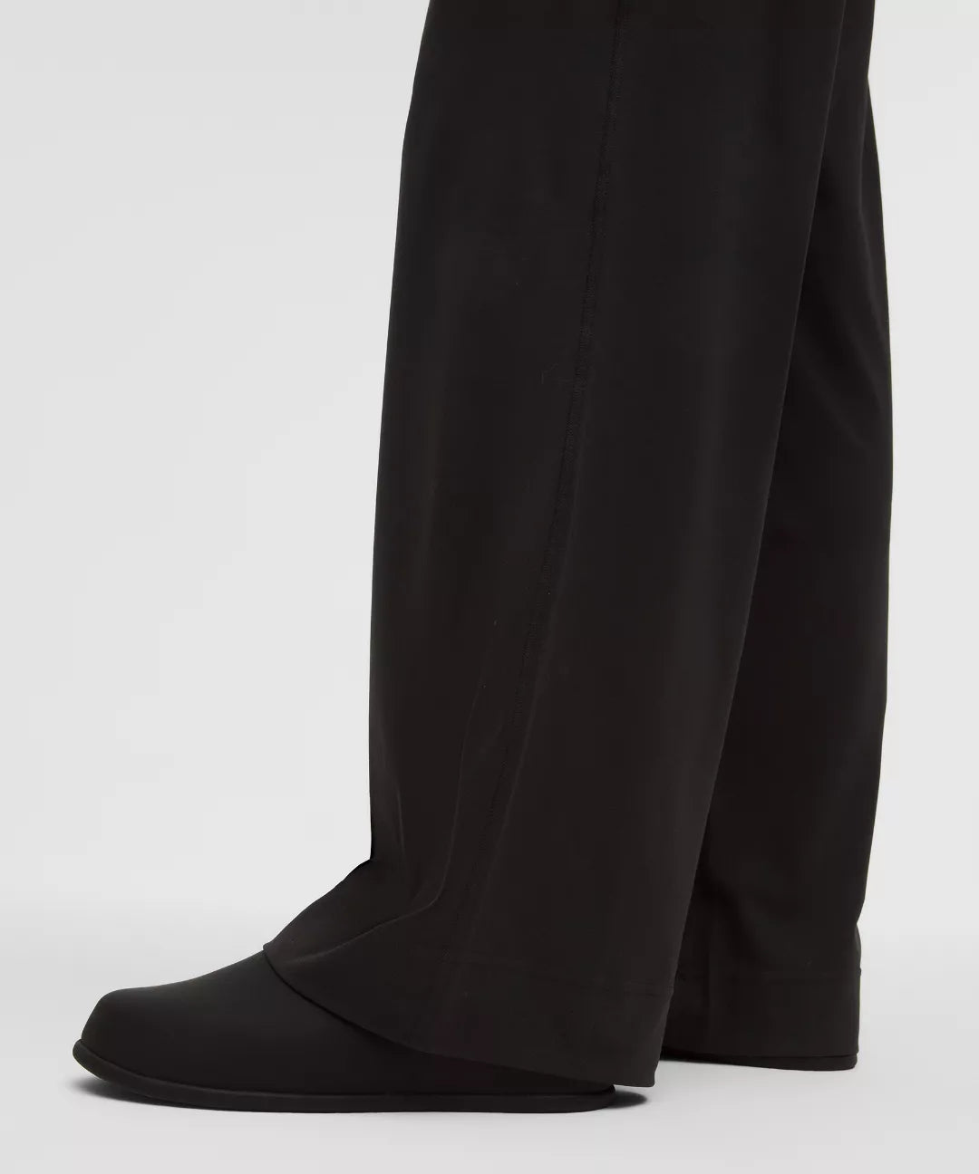 Black wide-leg pants on a white background